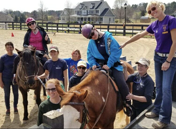 Wendy Schonfeld (far right)  and a group of RideAbility clients and volunteers enjoying a therapeutic ride/courtesy Wendy Schonfeld