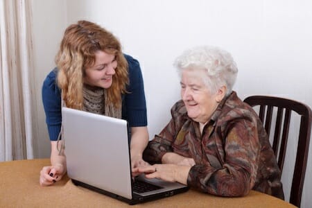 stock_teen_teaching_senior_on_computer_blog.jpg