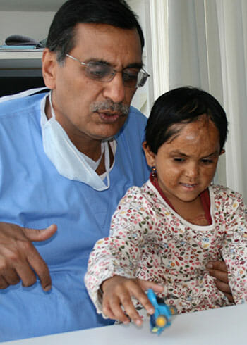 Meher was severely burned at age 4. Chess Without Borders helped raise money to pay for her surgery, and continued to help Meher and her classmates with donations of clothing, money for computers, and more.