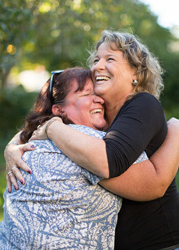 Daily Point of Light Award honoree Kathy Koenigsdorf (right), who lost her son to a heroin overdose, co-founded the Jake Koenigsdorf Foundation to provide resources and support to recovering addicts and their families.