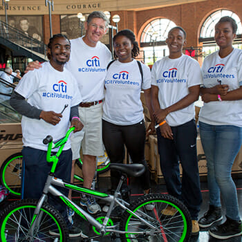 Service Scholars from the Abyssinian Development Corporation, along with Citi CEO Mike Corbat, built bikes for children in need.