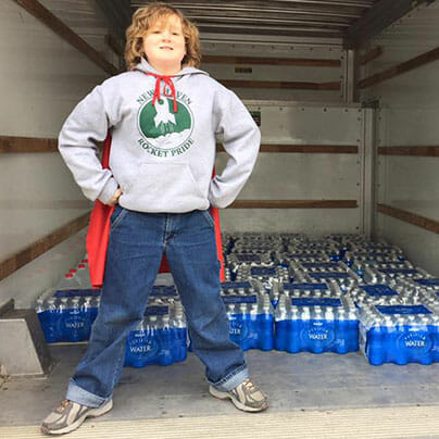 Super Ewan delivered more than 2,000 bottles of water to the residents of Flint, Michigan, to help with the city's ongoing water crisis.