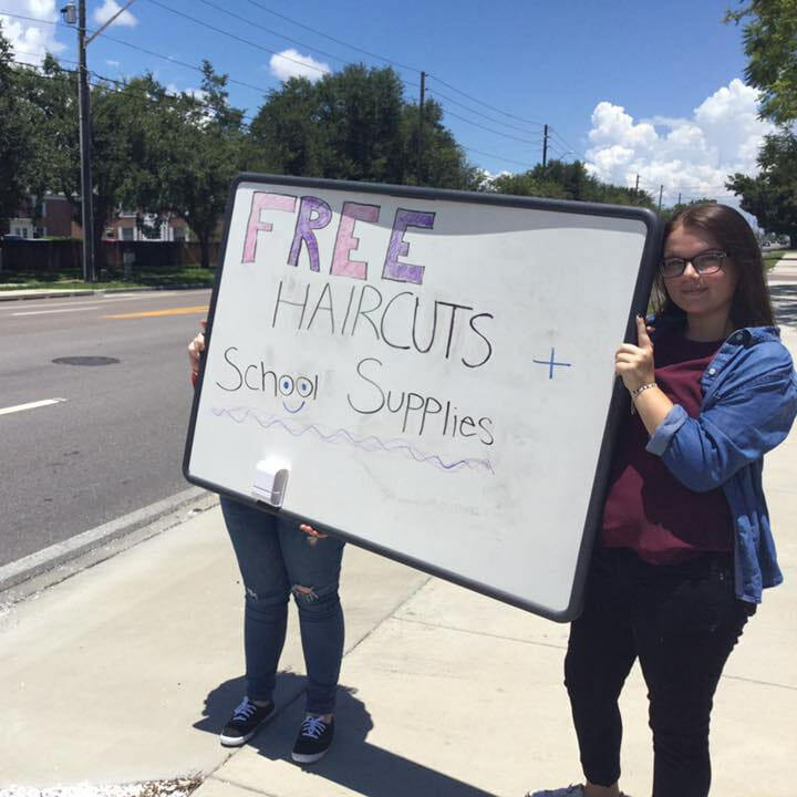 Ashley Rhodes-Courter founded the Foundation for Sustainable Families which organized "Haircuts from the Heart," where students heading back to school could come to get free haircuts and school supplies.