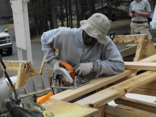 Frandy Osais-Louis volunteered with Habitat for Humanity after tornadoes hit Alabama./Courtesy Frandy Osias-Louis