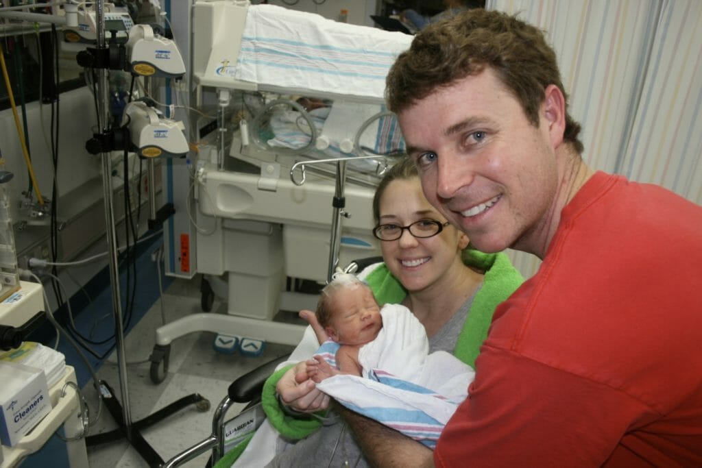 Heather and Bennett Barrow with their son, Hill, in the NICU.
