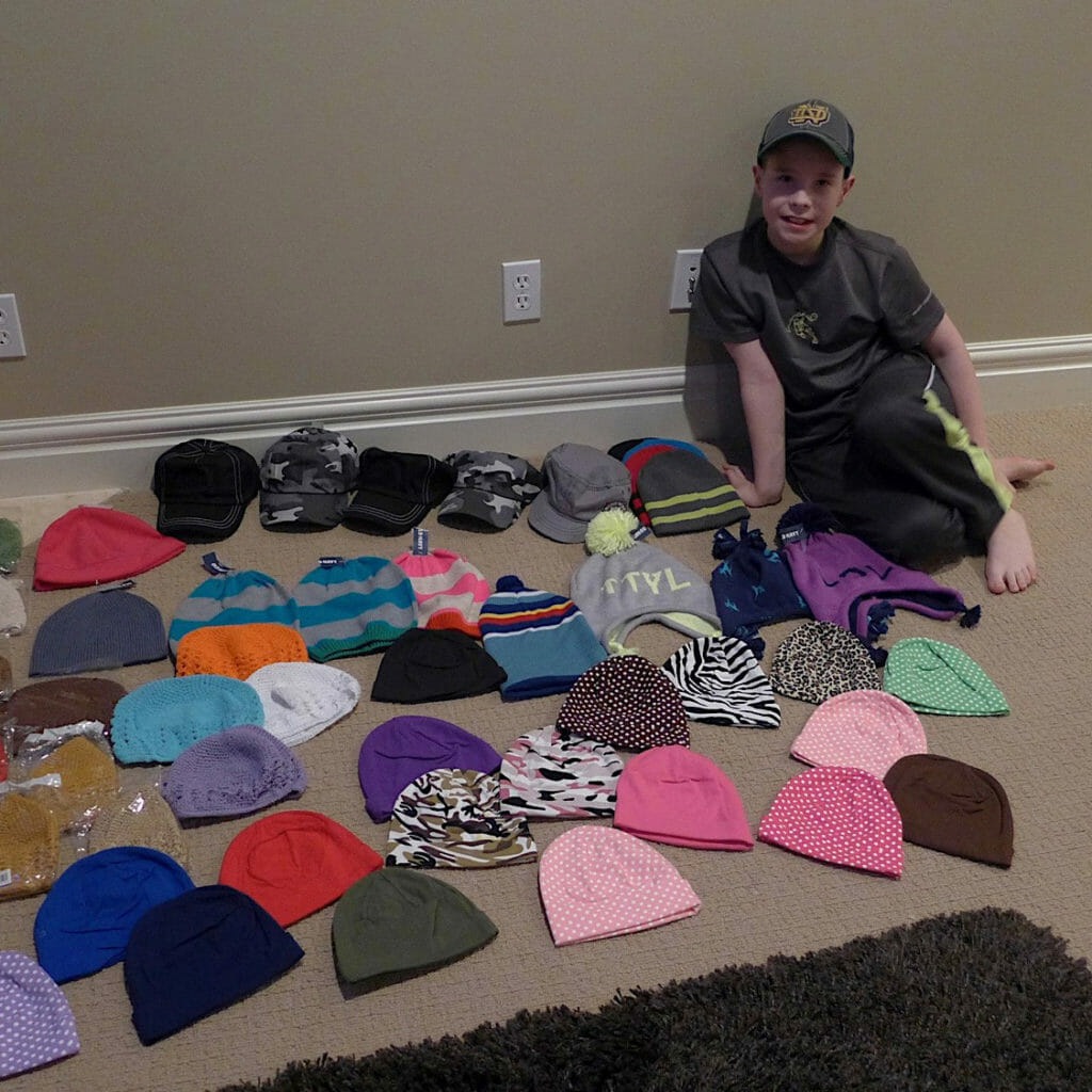 Hunter Gonzales prepares a delivery of hats he collected for ‎sick children at Primary Children's Medical Center in Salt Lake City, Utah. 