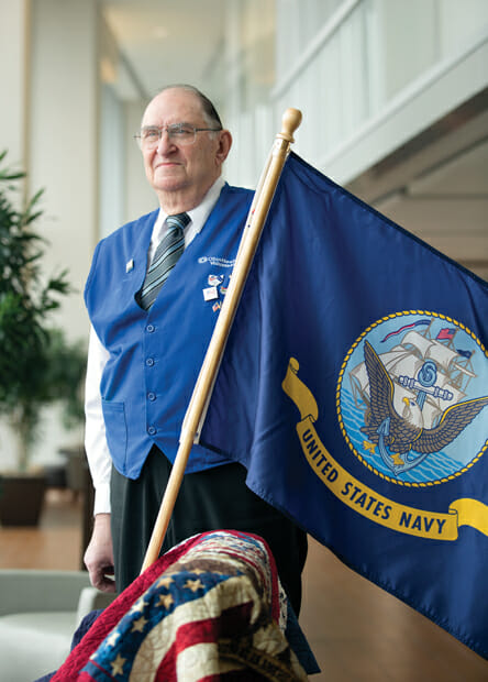 Bill Mirick in OhioHealth Riverside Methodist Hospital, in Columbus, Ohio with the United States Navy Flag/ Courtesy Tim Johnson