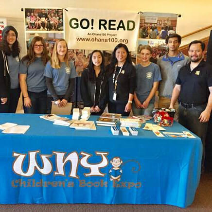 The Mattson family and youth volunteers with Ohana100 GO! READ Project promoted literacy at the Annual Western New York Children's Book Expo, gifting books to kids who attended the event.