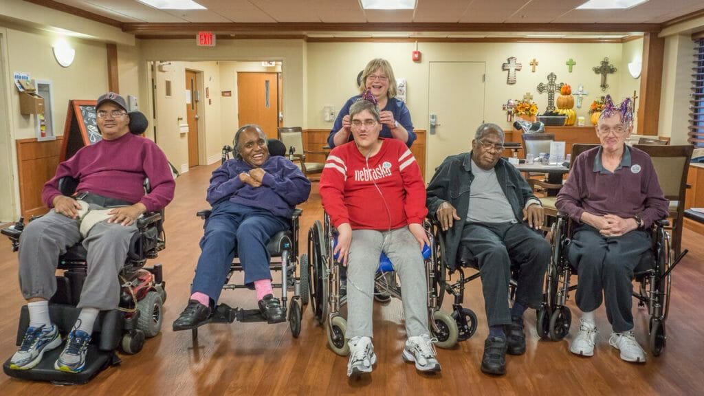 Joy with residents at Maple Crest Care Center. / Courtesy Dough Kuony