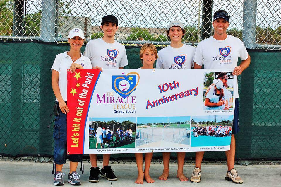 Julia (left) and Jeff Kadel (right) pictured with their three sons./Courtesy Julia Kadel