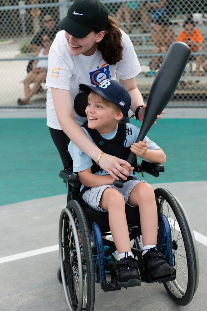 Volunteer Ava Goldstone and Miracle League player Josh./Courtesy Julia Kadel