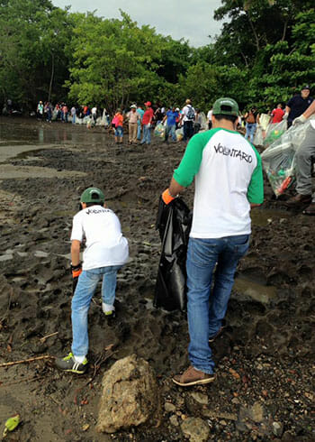 Volunteers help pick up trash in coastal areas during the 2016 National Beach Cleanup Day.