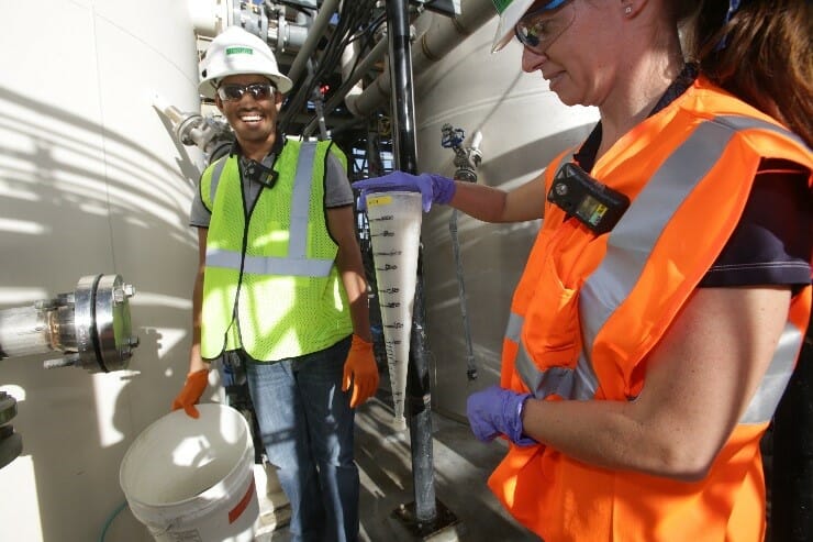 A member of Freeport-McMoRan's University Teams program works with a student at the South Dakota School of Mines on a capstone project.