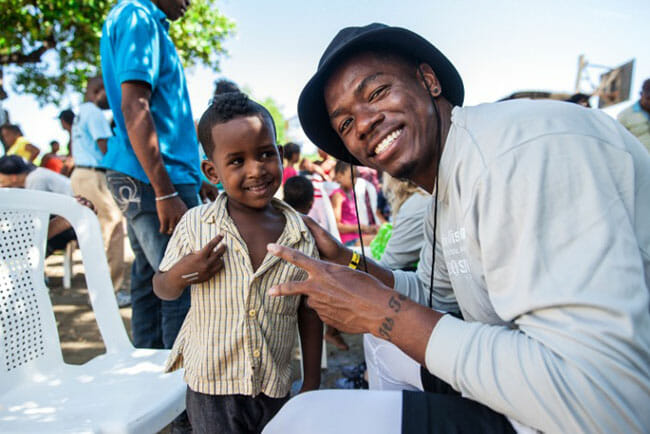 Working with Soles4Souls, Coty Sensabaugh distributes shoes in the Dominican Republic. 