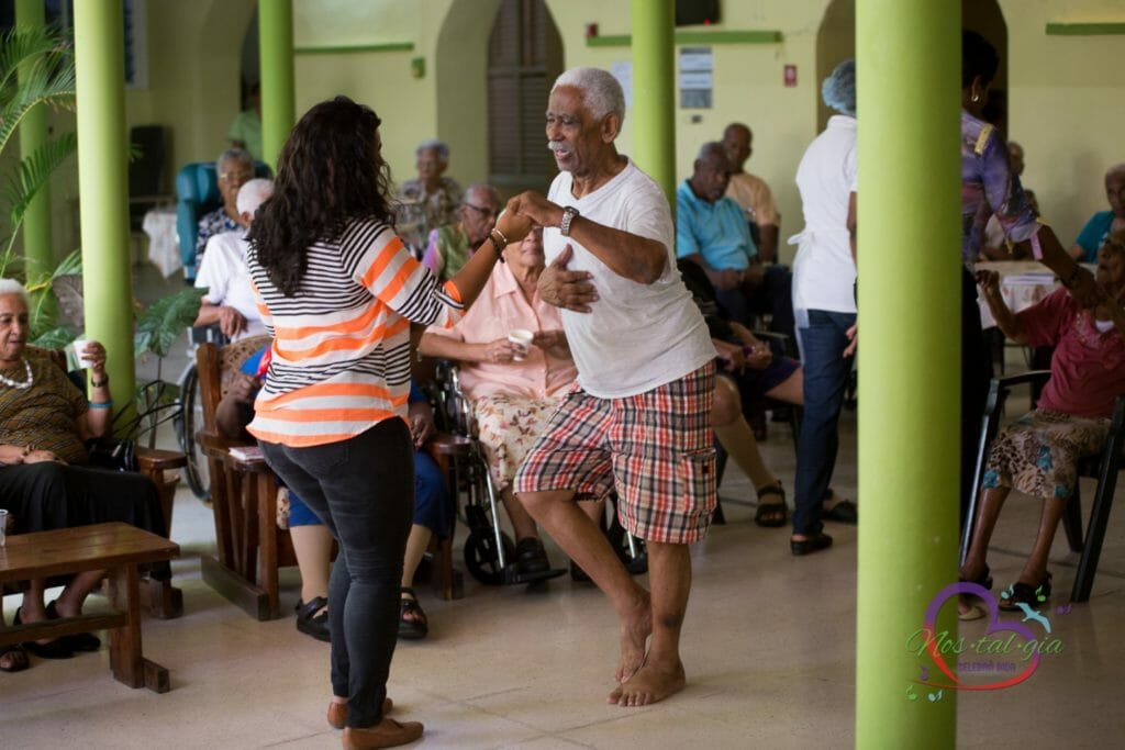 Through the Nostalgia program, volunteers with Curaçao Cares bring musical entertainment to senior care homes.