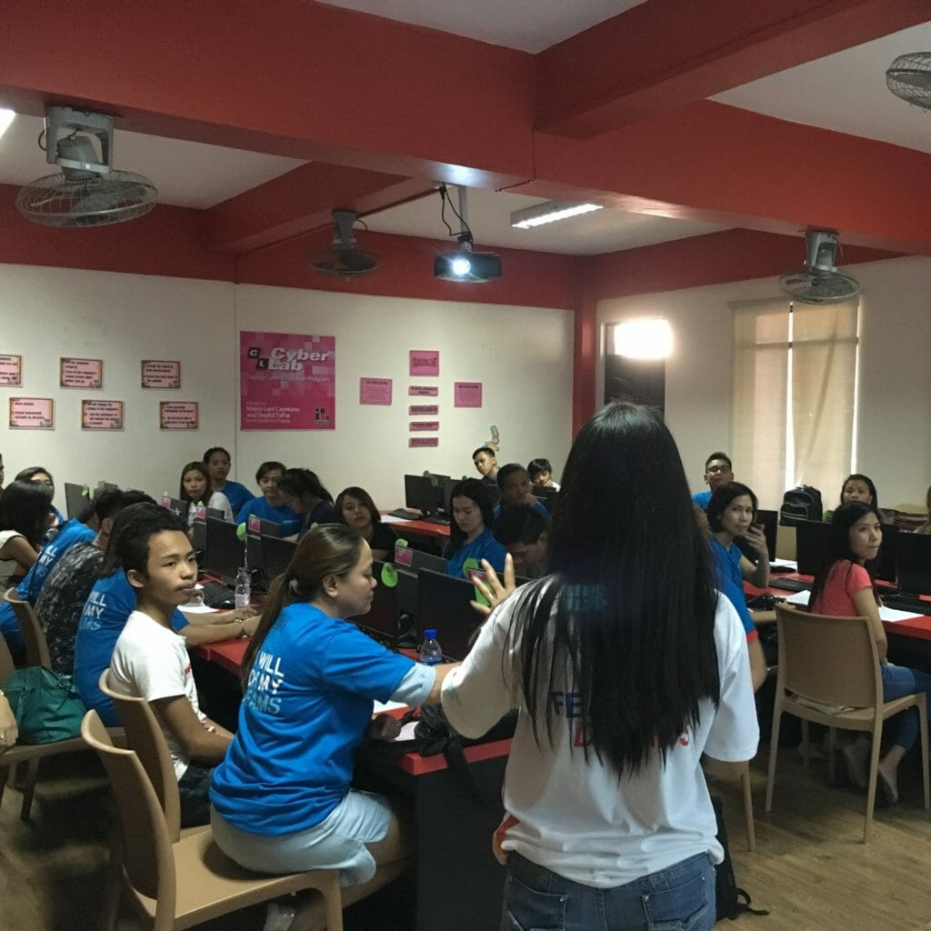 Convergys’ employee volunteers visit schools in the Philippines to provide youth and adults with education and training, often geared toward helping them gain employment.