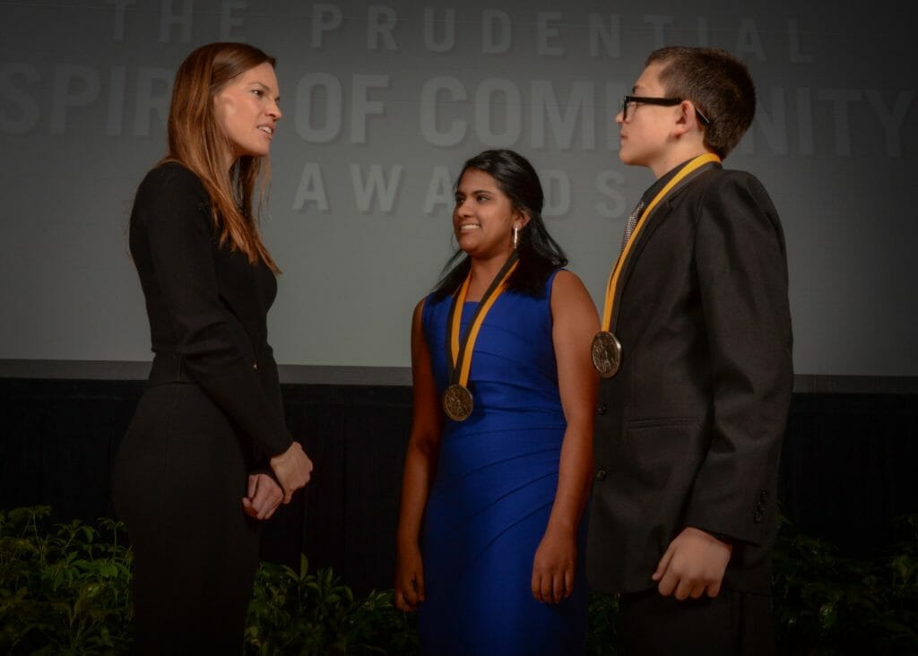 Ananya Murali and Lucas Smith, 2016 Prudential Spirit of Community Award State Honorees for Wisconsin, meet with actress Hilary Swank at the national award ceremony in Washington, D.C.