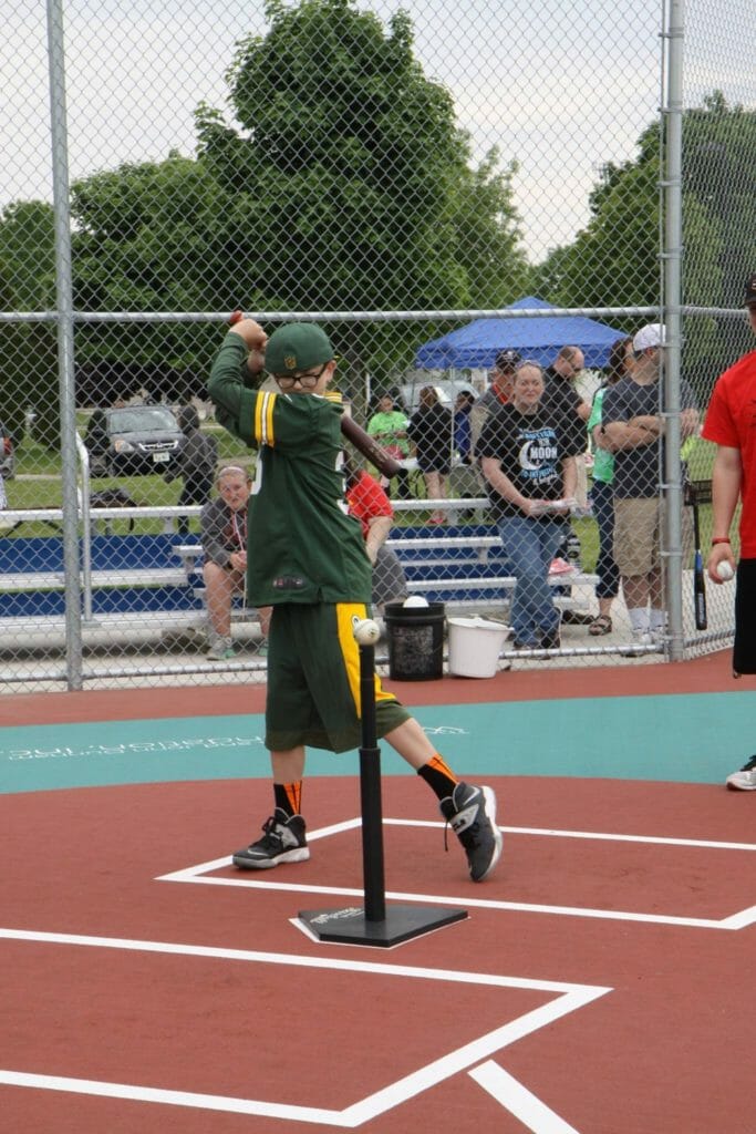 Lucas Smith plays with the Miracle League, an organization that makes baseball accessible to children with special needs.