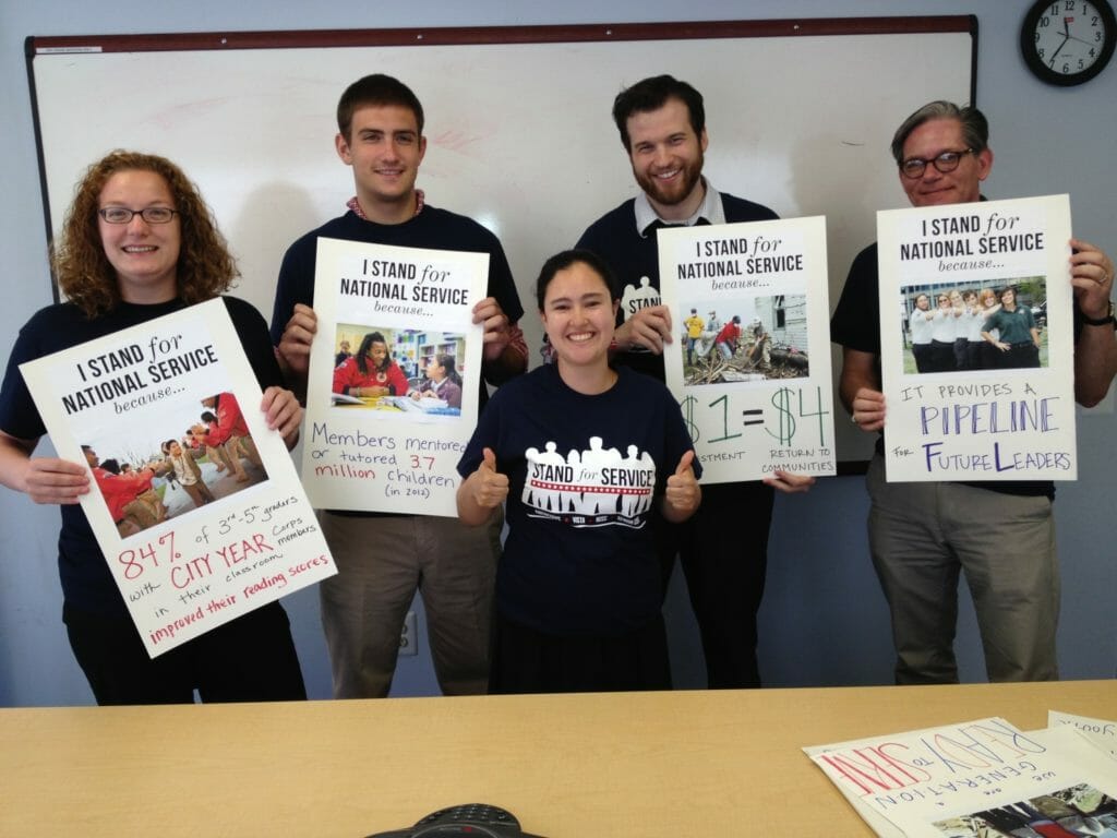 Morgan and several AmeriCorps alums prepare for a rally on Capitol Hill in support of funding for national service.