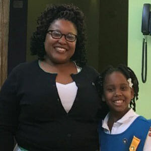 Chatoya Hayes with Taylor Sumlin, who had just completed her bridging ceremony to move from being a Daisy to a Brownie.