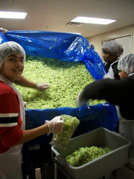 Chintan volunteering at the Gleaners Community Food Bank./Courtesy Chintan Maheshwari