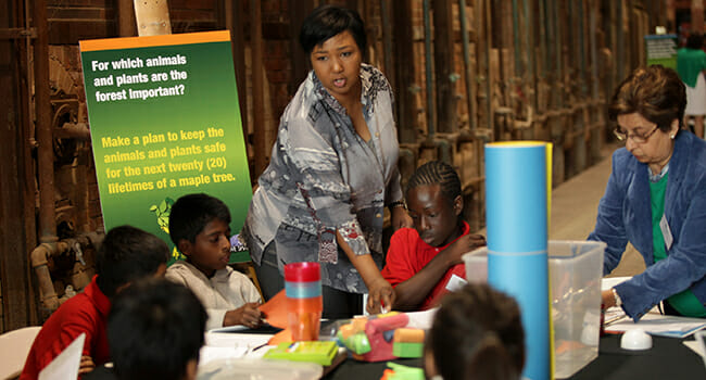 Dr. Mae Jemison engages with students during a workshop at her international science camp, The Earth We Share.