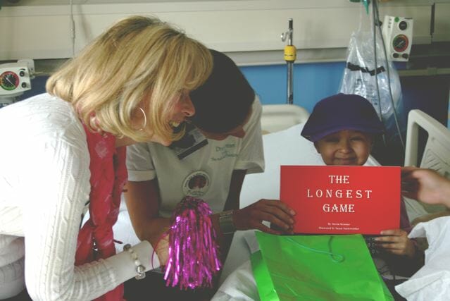 Susan Vincent visits with a patient at Children's Hospital Los Angeles.