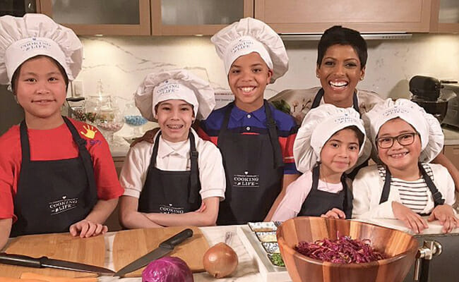 Tamron Hall spends an afternoon cooking at her Manhattan apartment with five children from Common Thread, a program created for low-income students in urban areas that promotes diversity and nutrition.