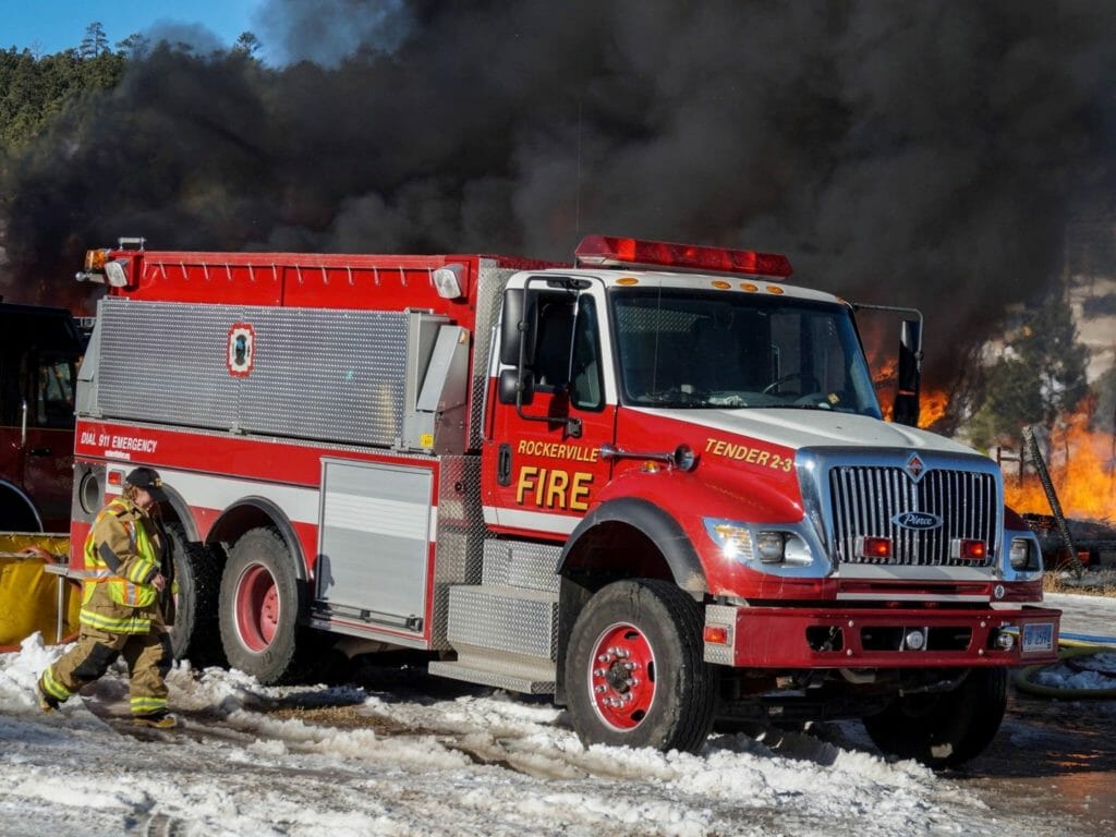 Kathy Deml participating in a controlled burn during a training excercise./Courtesy Kathy Deml