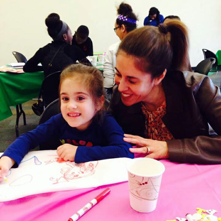 Andrea and Amanda participate in a pet rescue project during a Family Service Saturday with HandsOn Atlanta.