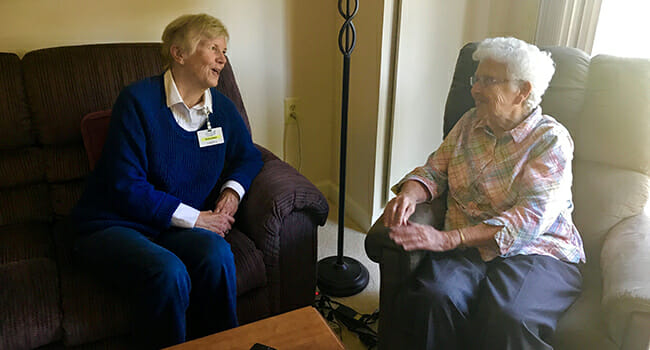 Gwen Joseph (left) interviewing Canterbury-on-the-Lake resident Ruth Creech.