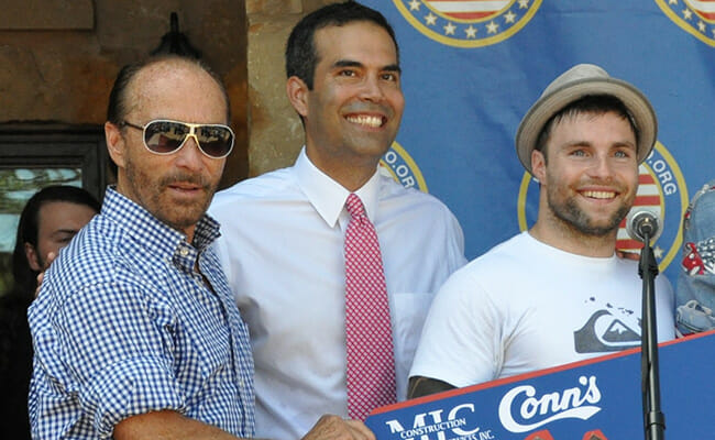 Lee Greenwood joins Hon. George P. Bush (center) to present SPC  (Ret.) J.P. Lane, U.S. Army with the keys to his new home. (Photo courtesy Meredith Iler)  