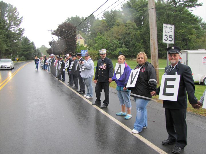 Participants in the St. Baldrick's Line of Hope event form a line along a street in Eldred, New York./Courtesy Lou Monteleone