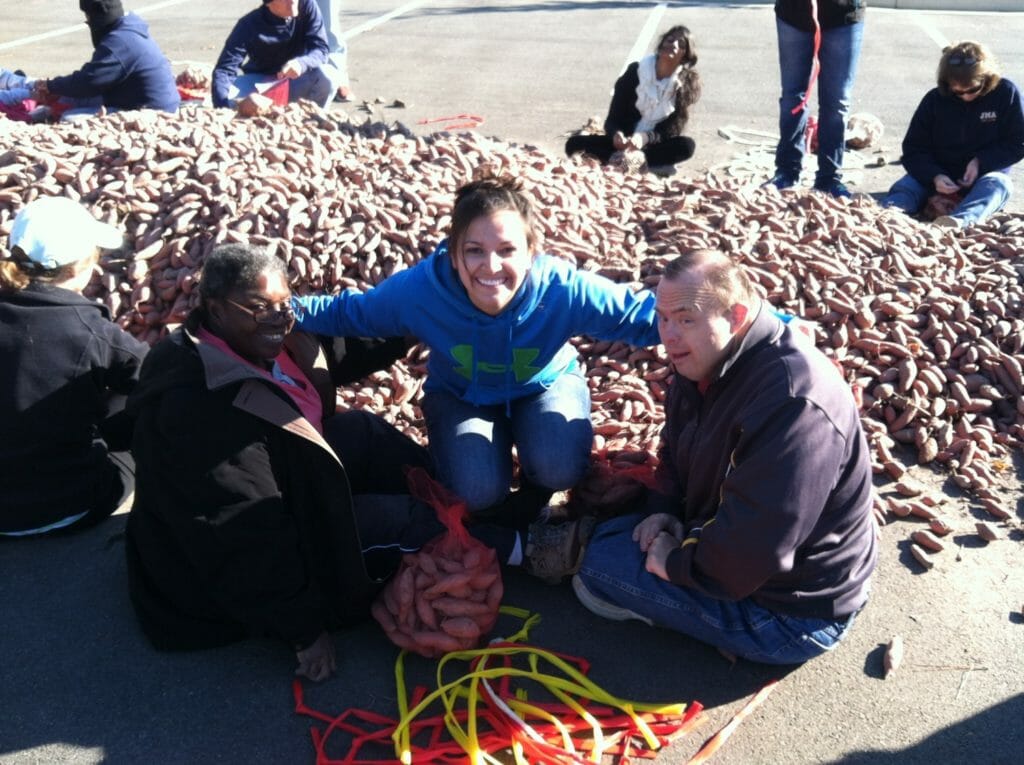 Natalia (center) at a potato drop with clients of the Life Enrichement Center./Courtesy Natalia Jones