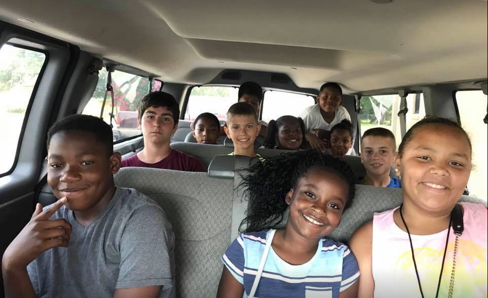 Curt (second row, far right) and his club members on their way to help out at a local food pantry./Courtesy Curt Fendley