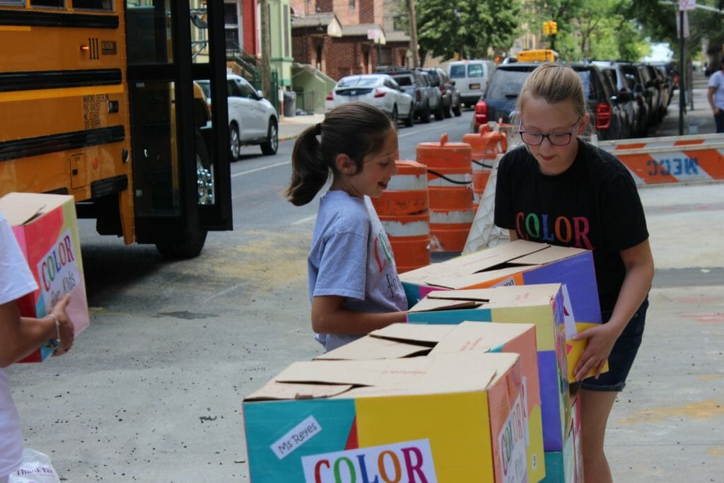 Bethany Kuster (right) delivers art supplies to Fairmont Neighborhood School in the Bronx area of New York City./Courtesy Bethany Custer