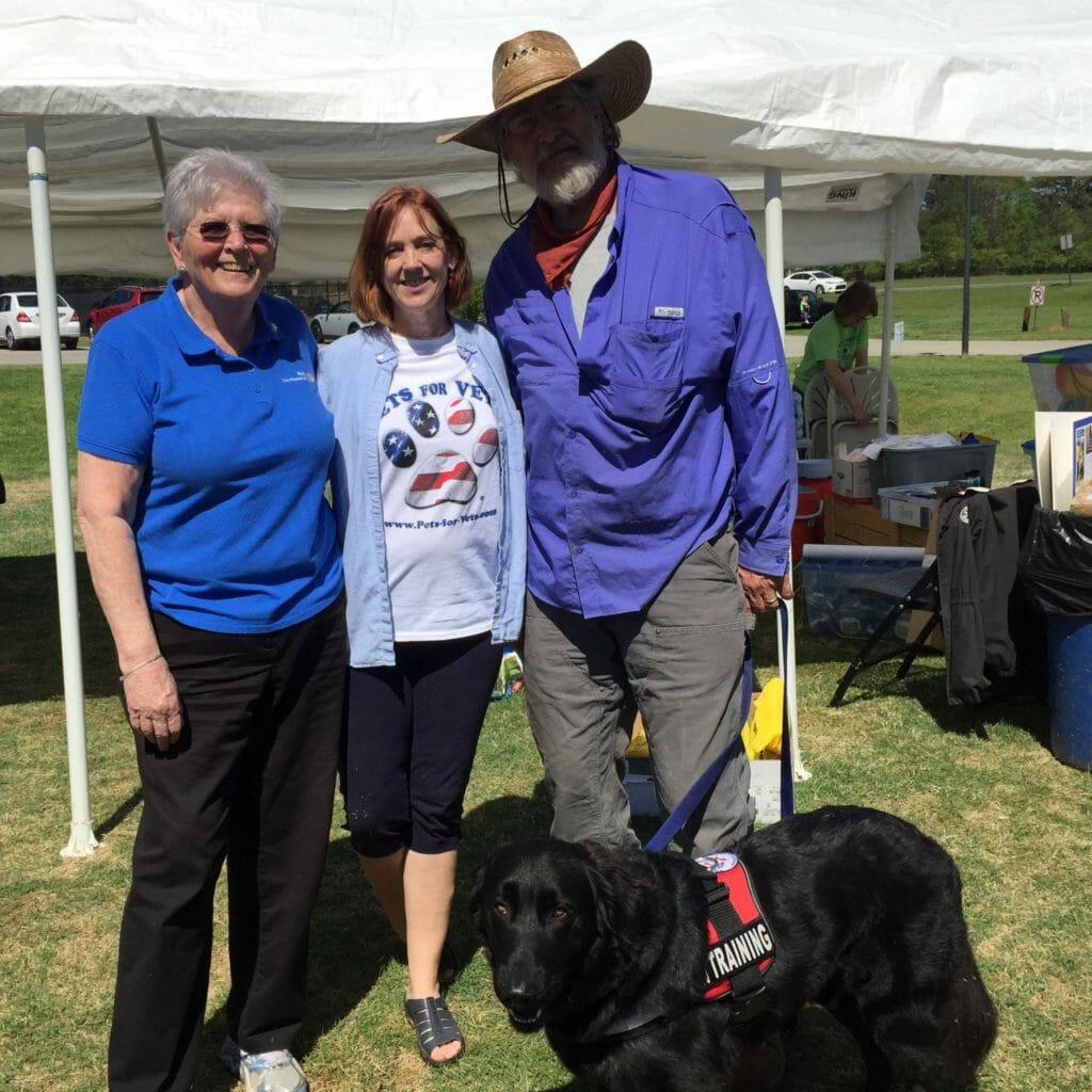 At the Fayette Daybreak Rotary Club 5K Walk Fundraiser, Barbara Blair was joined by event organizer Carol Stallings, trainer Rick Jones, and companion-dog-in-training, Admiral.
