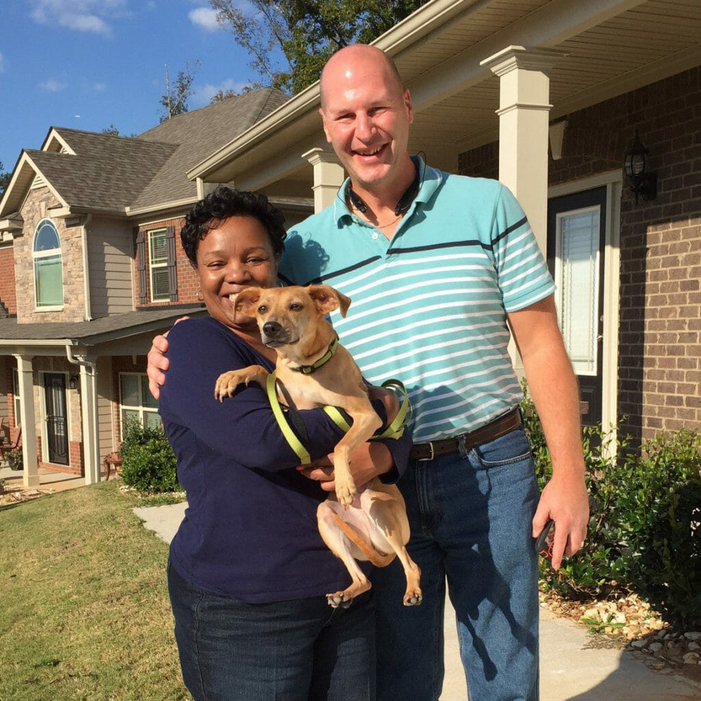 Trainer Mark Schubert presents companion dog, Libby, to Veteran Army Private Darlene Lanier.  Libby was sponsored by the Fayette Daybreak Rotary Club as part of the Pets for Vets GA Companion Dog Sponsorship program.