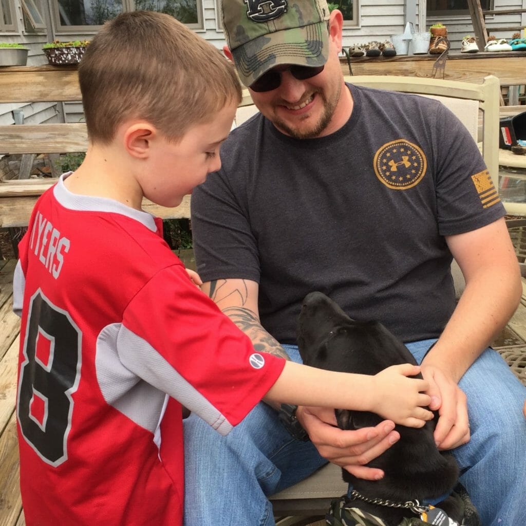 Veteran Army Sergeant Chris Myers served nine years in the military, including two tours in Iraq. He was presented with his companion dog, Buster, in June 2016 by trainers Rick and Mary Pat Jones.