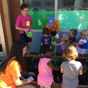 Grow Healthy teen volunteers participate in a garden project at a St. Louis daycare.