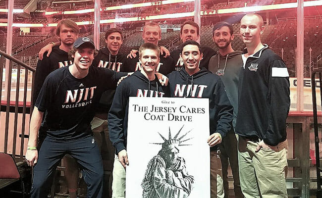 The New Jersey Institute of Technology men's volleyball team pitched in during the Jersey Cares coat drive, collecting donations at a New Jersey Devils pro hockey game.