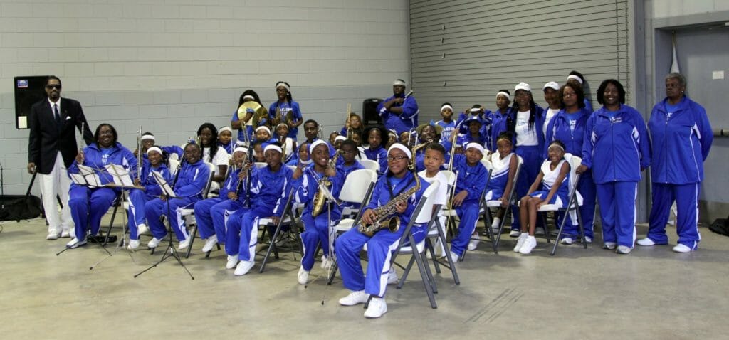 Stan's band seated to play at a Veteran’s Day ceremony in Union Springs, Alabama./Courtesy Stanley Cooks