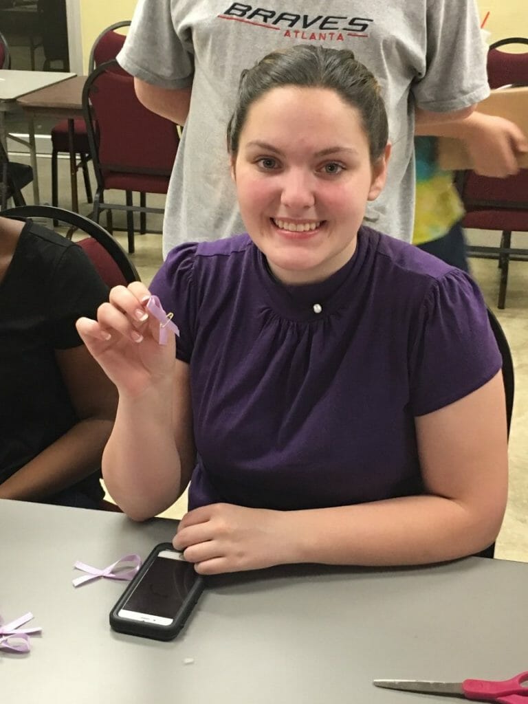 Amanda Cathcart making ribbons for Purple Up Day./Courtesy Amanda Cathcart