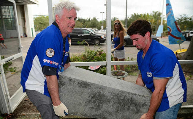 During Marlins Day of Service and Philanthropy in 2014, Claude and his team helped clean up debris at Shake-A-Leg Miami. 