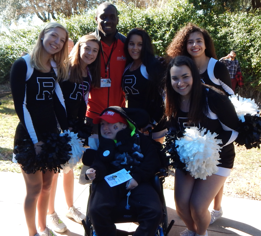 Eve Glenn (far right, back row) at a meet and greet with children at the Tampa Shriners Hospital for Children./Courtesy Eve Glenn