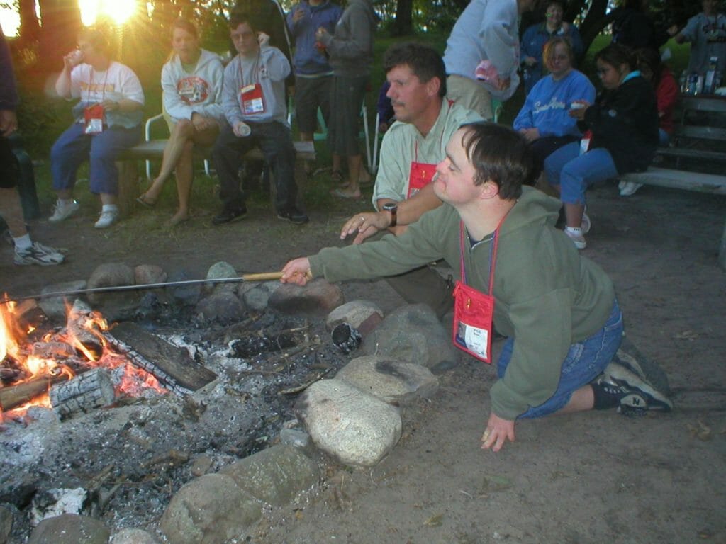 Paul assists a camper at Camp Wingspan./Courtesy Paul Langenfeld
