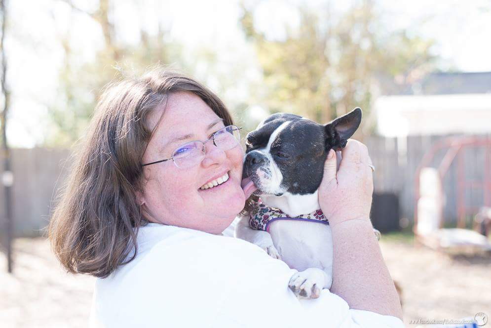 Renee with Audrey. Audrey was rescued nearly fur-less from animal control./Courtesy Renee Bryson & Courtney Ussery