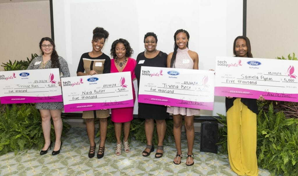 Laine Powell (third from left) and Tech Sassy Girlz scholarship recipients./Courtesy 106foto