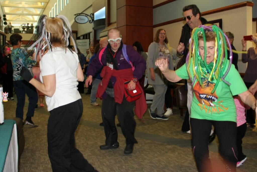 A recent special Flash Mob fundraiser. Loretta (far right) is pictured with CTCA CEO Jay Foley (man wearing sunglasses)./Courtesy Loretta Brunetti