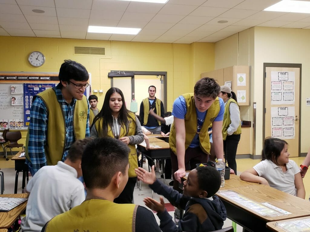 Rees (far right) Volunteering at a Baltimore school./Courtesy Rees Draminski